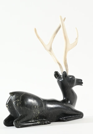 Kneeling Caribou by Osuitok Ipeelie