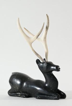 Kneeling Caribou by Osuitok Ipeelie