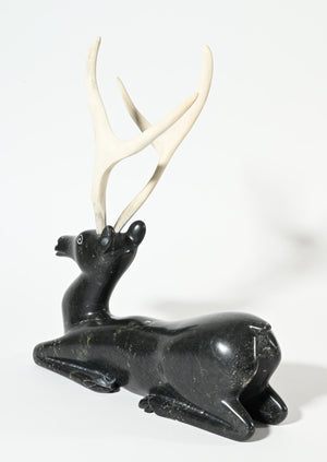 Kneeling Caribou by Osuitok Ipeelie