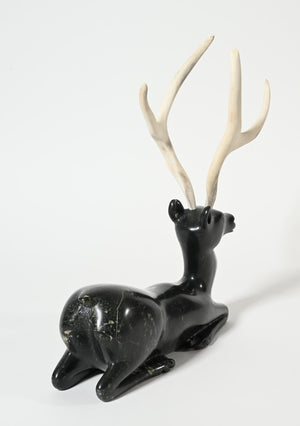 Kneeling Caribou by Osuitok Ipeelie