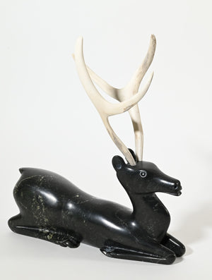 Kneeling Caribou by Osuitok Ipeelie