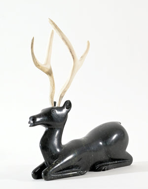 Kneeling Caribou by Osuitok Ipeelie