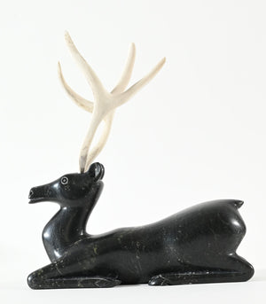 Kneeling Caribou by Osuitok Ipeelie