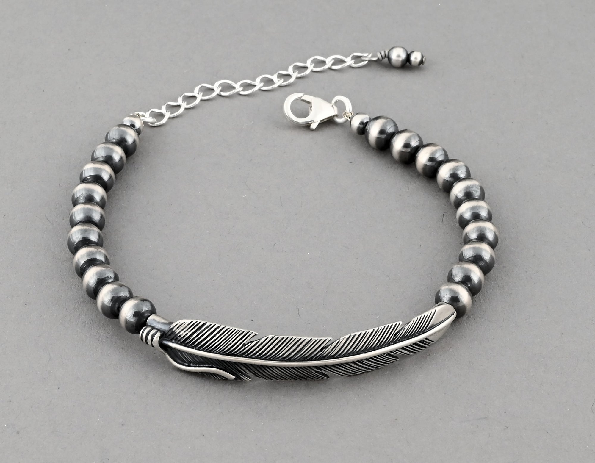 Feather Bracelet with Beads by Raymond Coriz