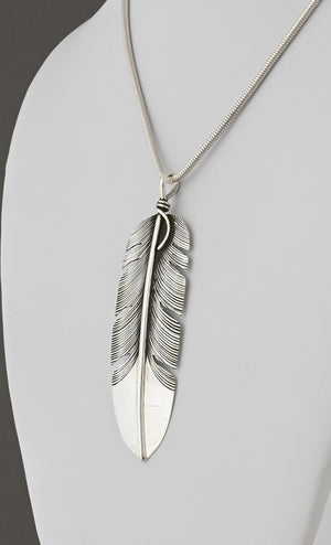 Feather Pendant by Lena Platero; 2  7/8"