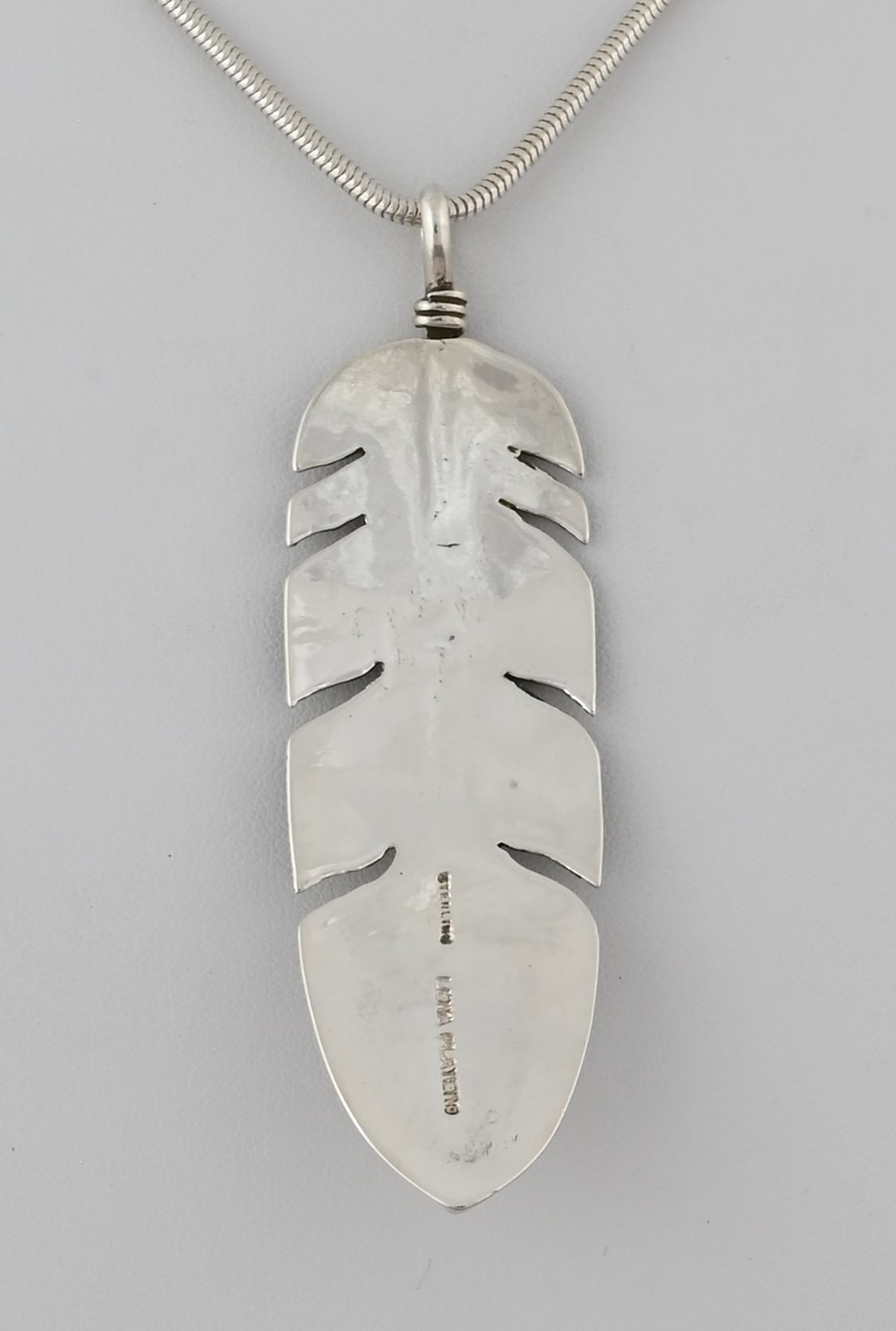 Feather Pendant by Lena Platero; 2  7/8"