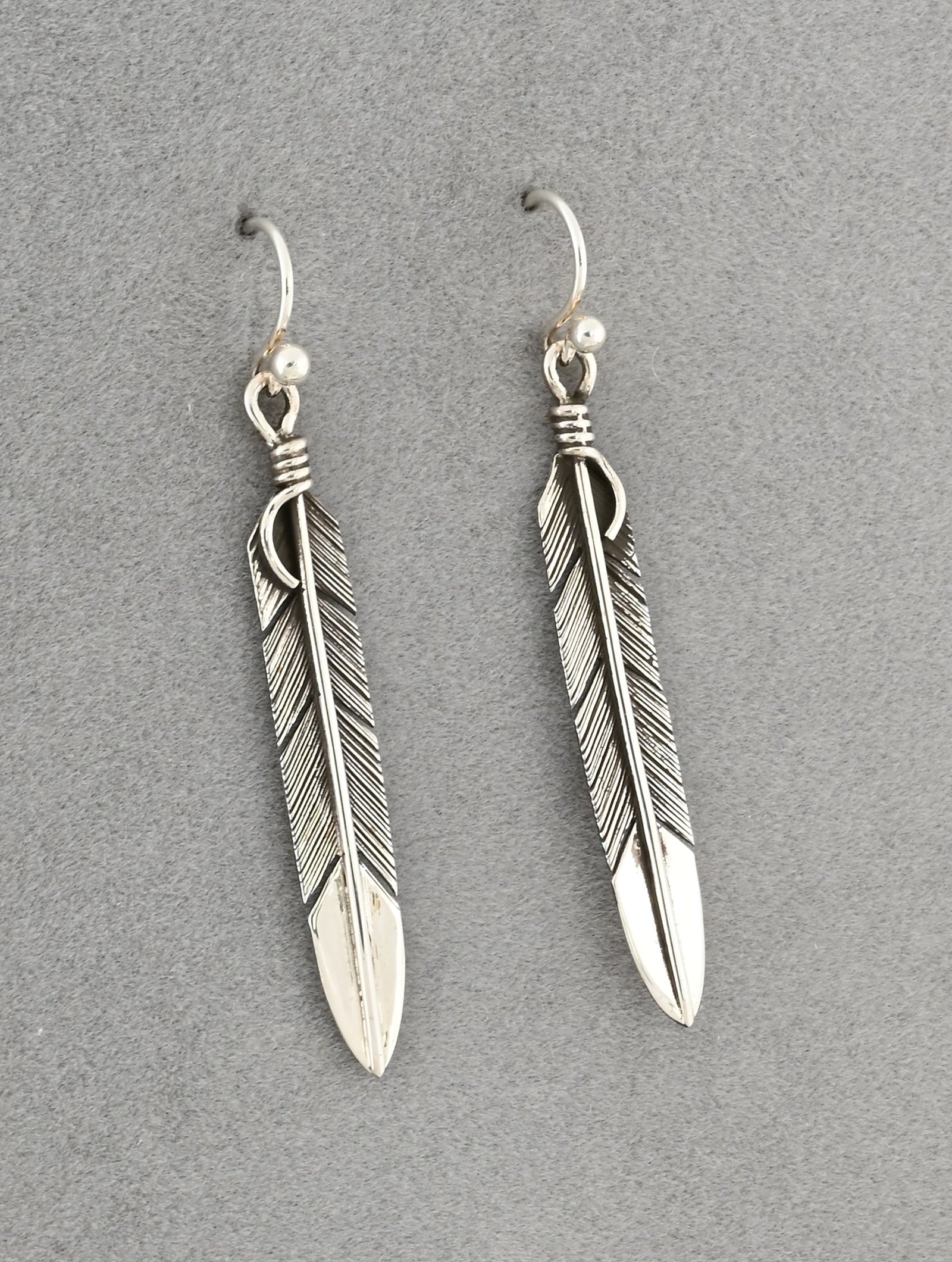 Feather Earrings by Raymond Coriz