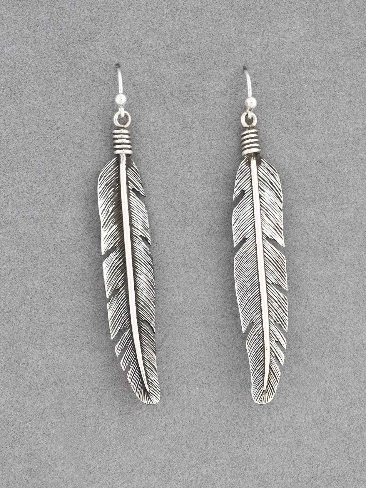 Earrings with Feathers by Raymond Coriz