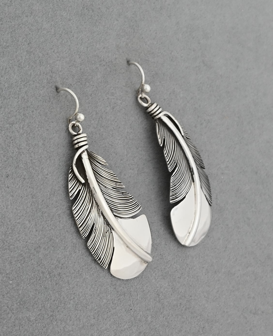 Earrings with Feathers by Raymond Coriz