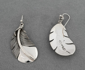 Earrings with Feathers by Raymond Coriz