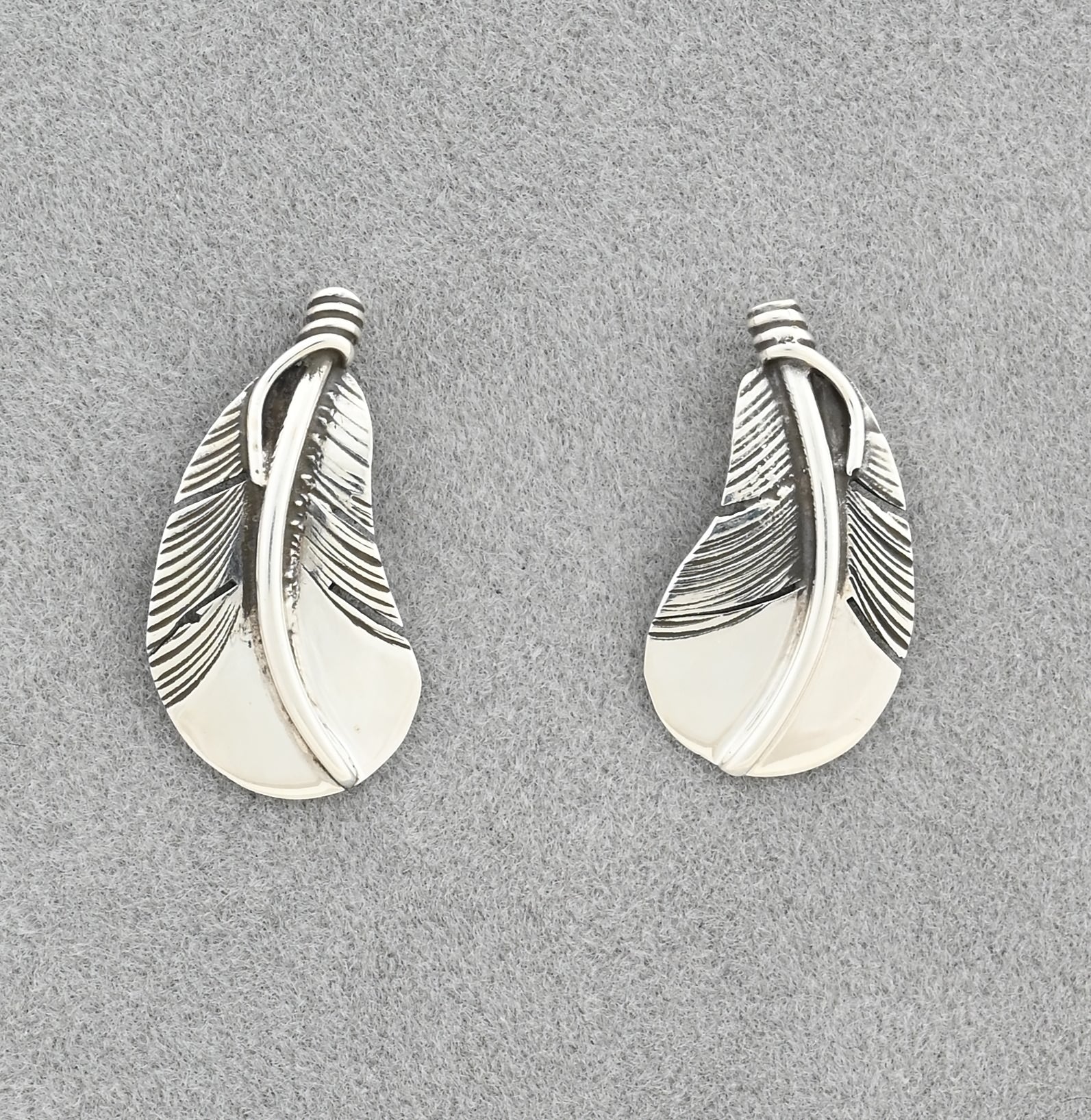 Earrings with Curved Feathers on posts by Raymond Coriz