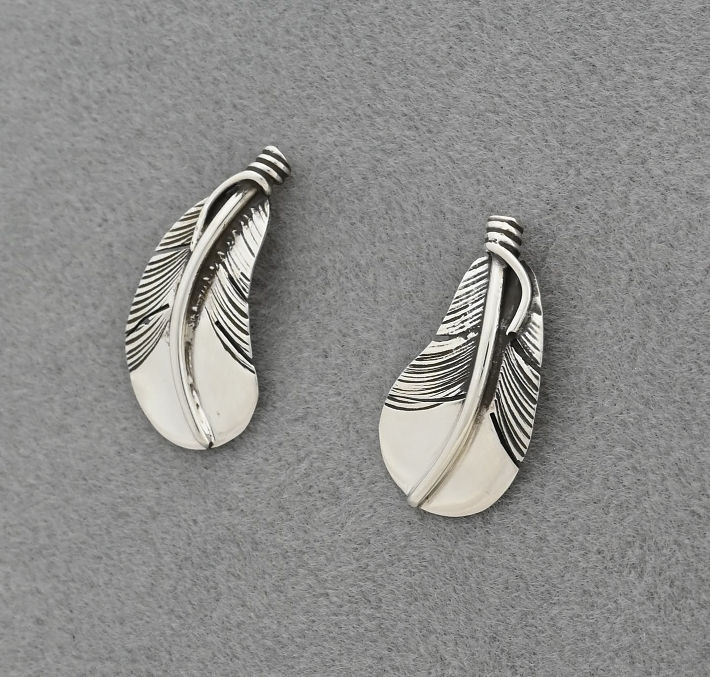 Earrings with Curved Feathers on posts by Raymond Coriz