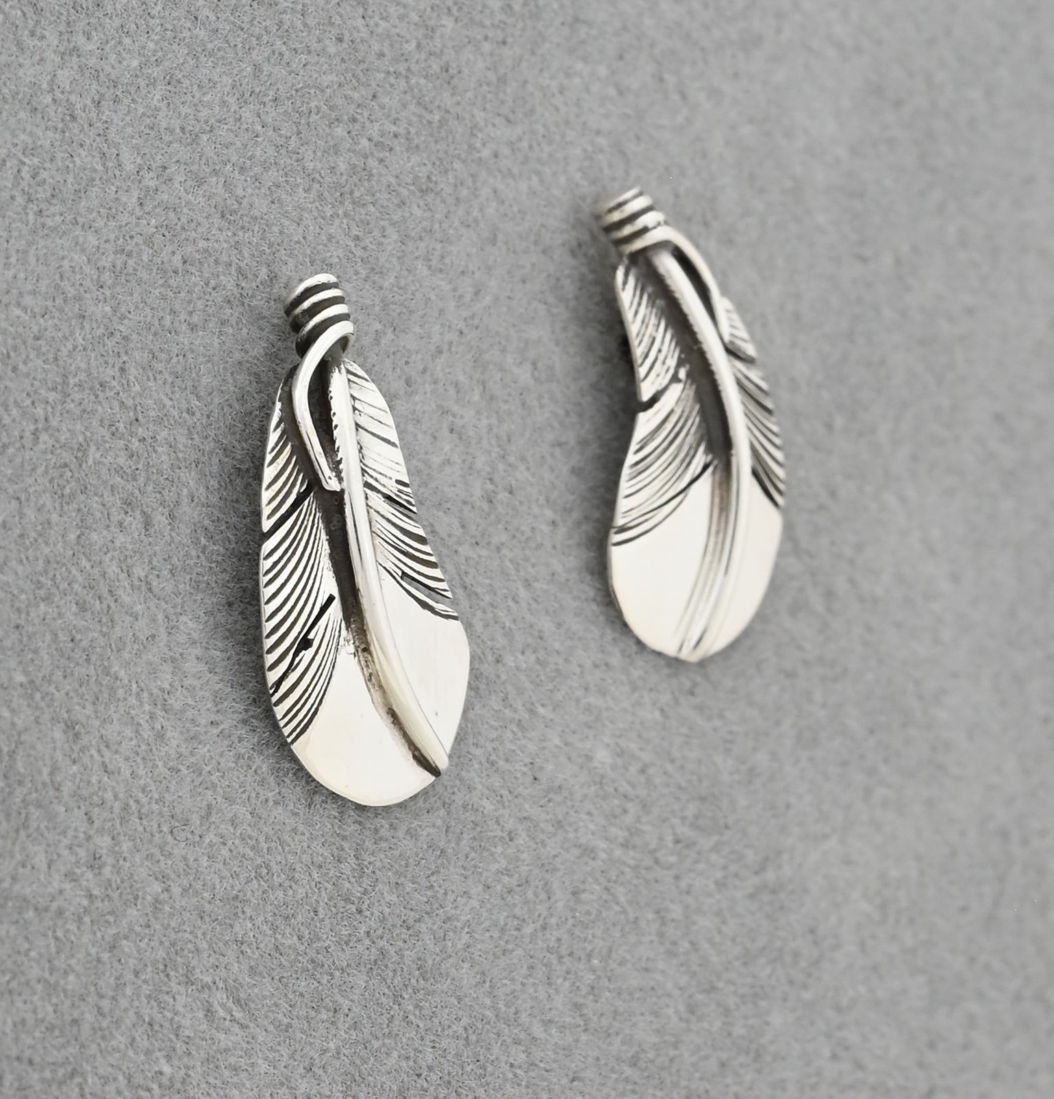 Earrings with Curved Feathers on posts by Raymond Coriz