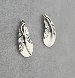 Earrings with Curved Feathers on posts by Raymond Coriz