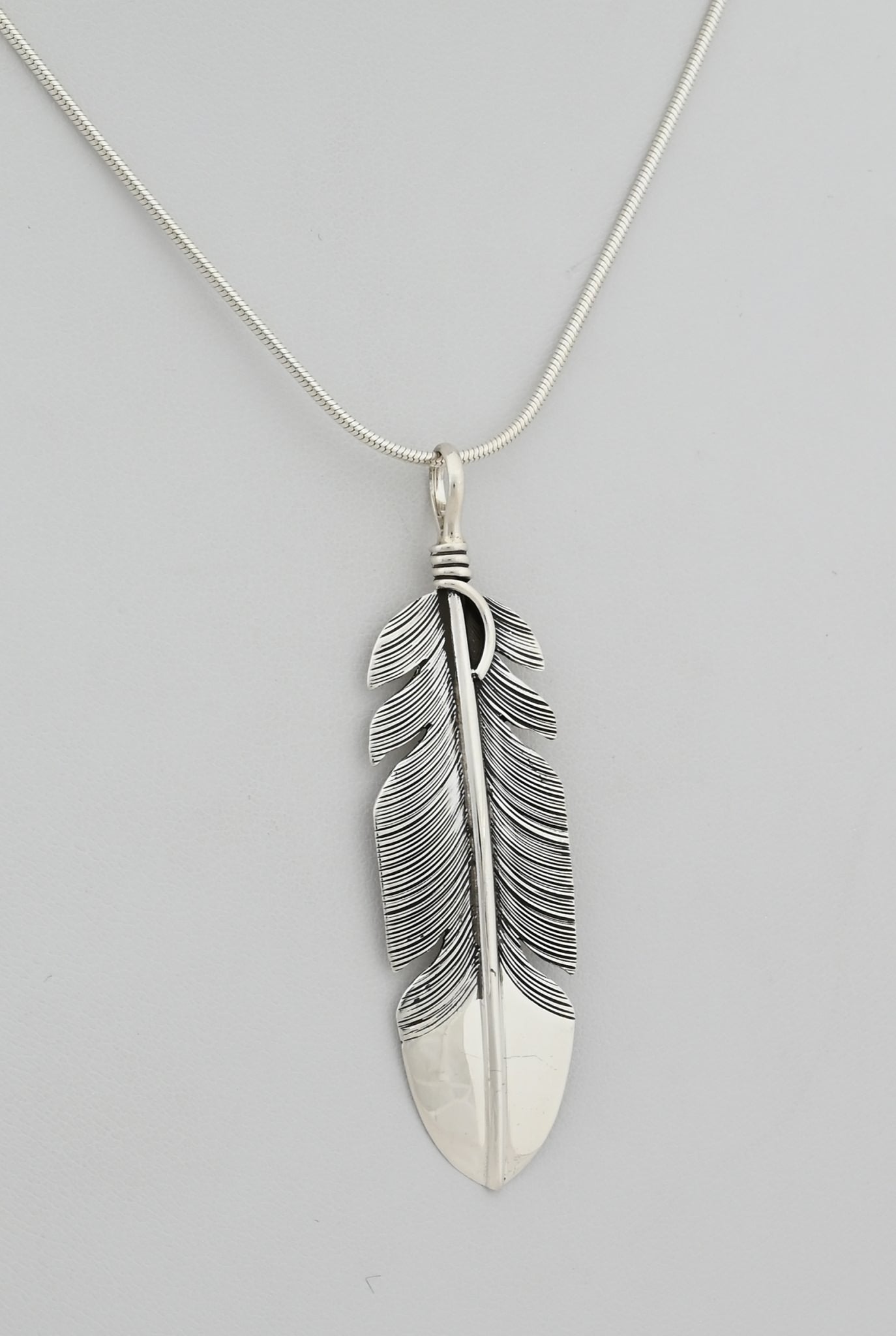 Pendant with Feather by Raymond Coriz