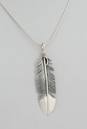 Pendant with Feather by Raymond Coriz