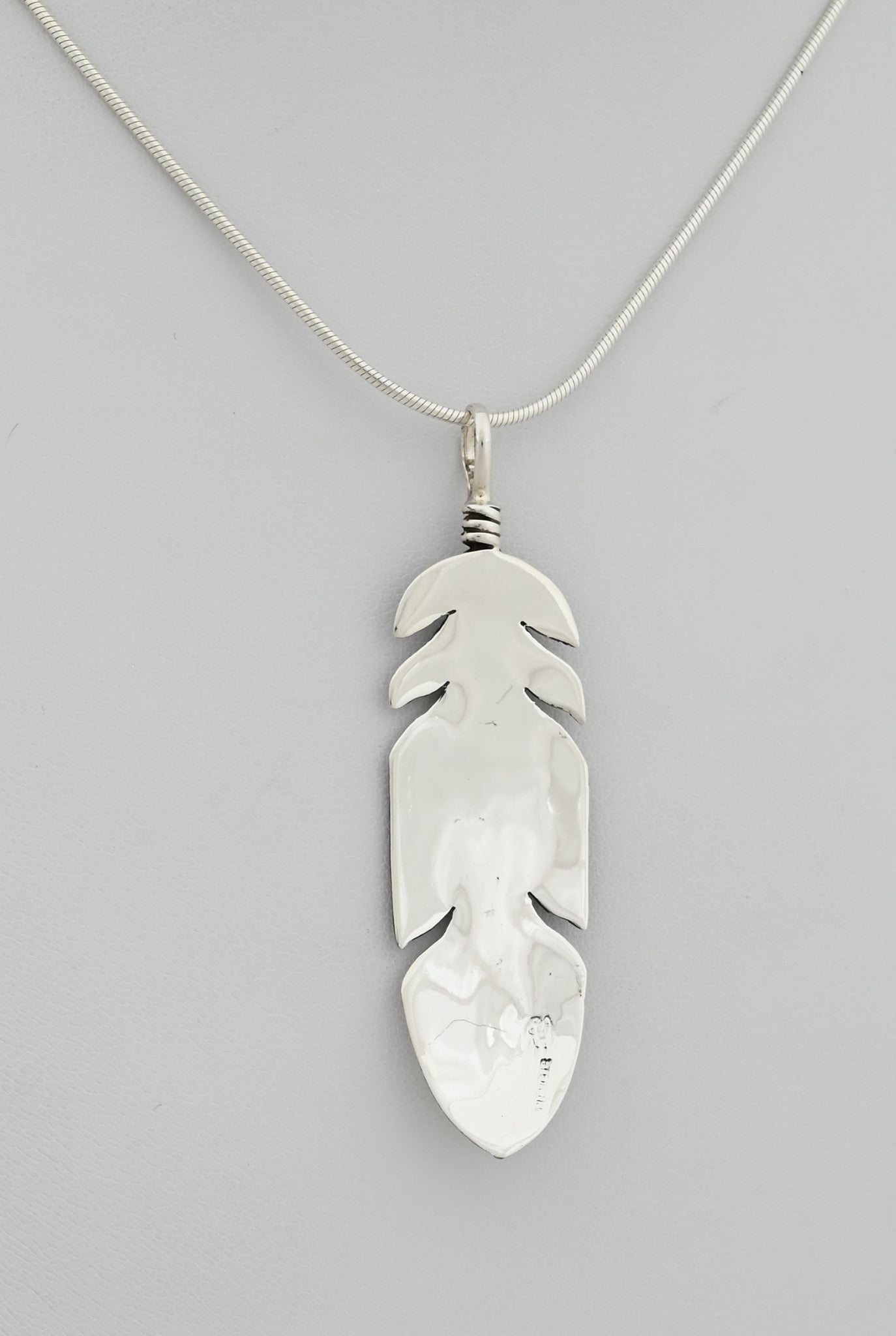 Pendant with Feather by Raymond Coriz