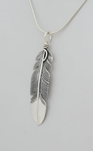 Pendant with Feather by Raymond Coriz