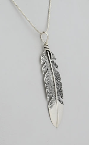 Pendant with Feather by Raymond Coriz