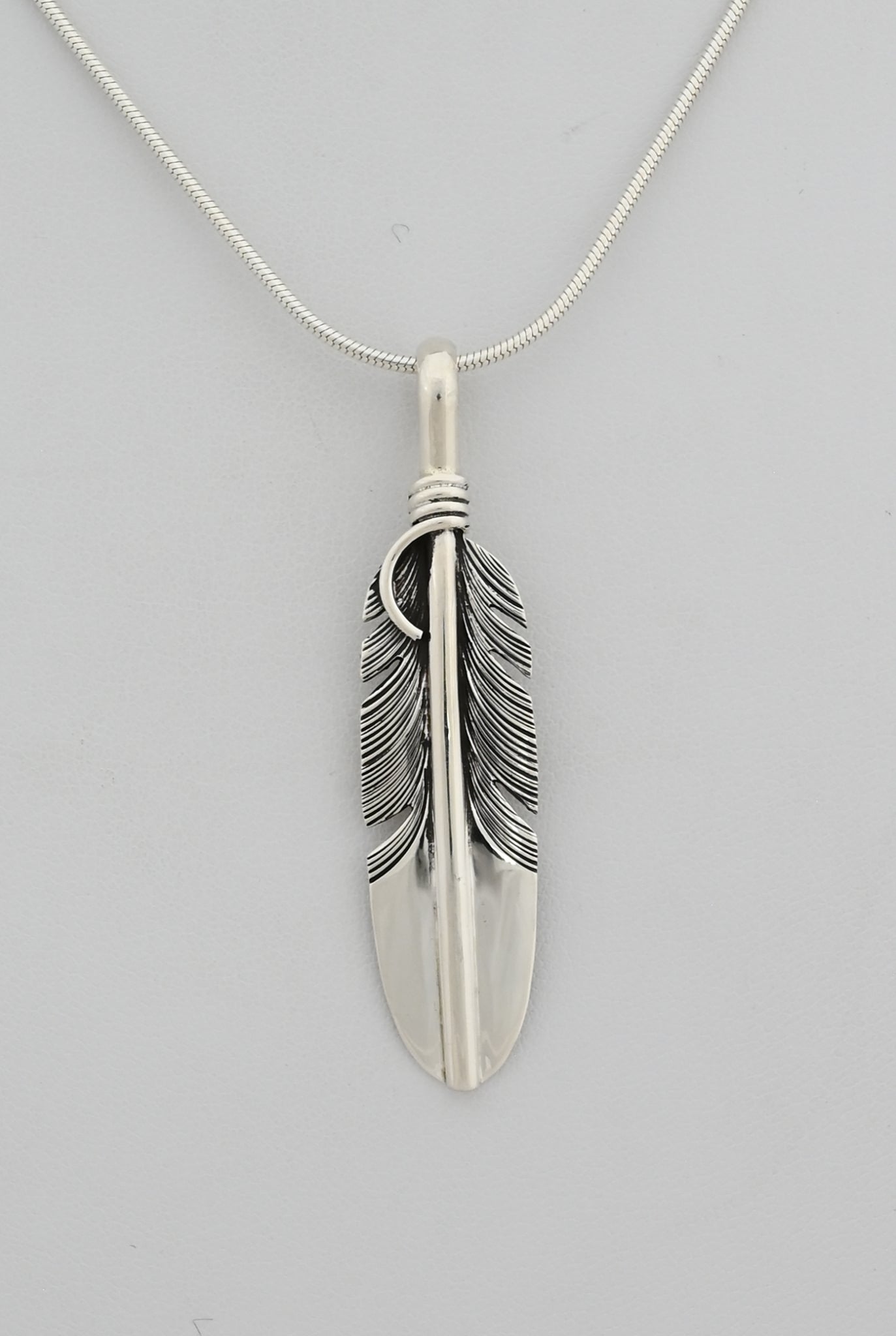 Pendant with Medium Feather by Raymond Coriz