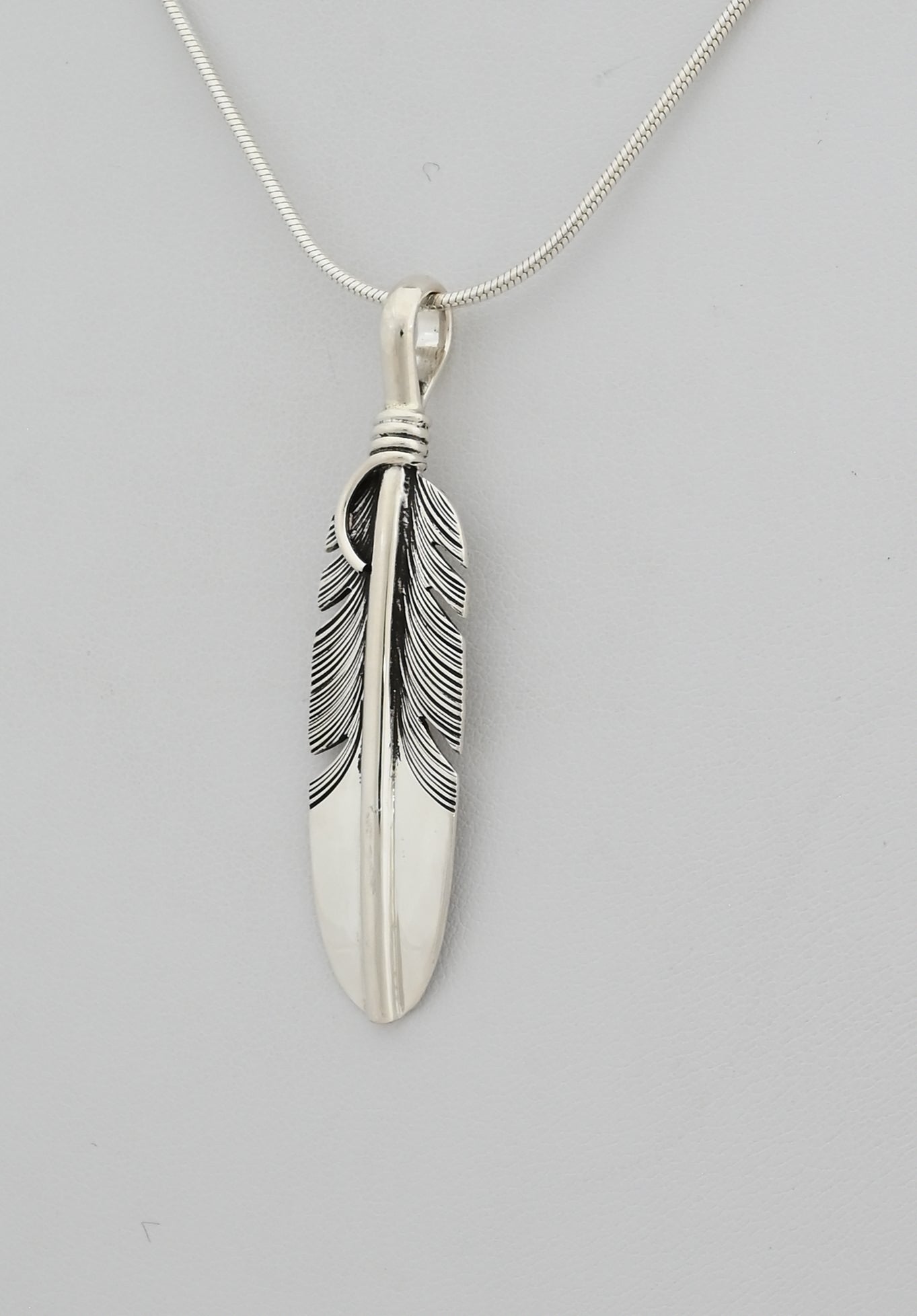 Pendant with Medium Feather by Raymond Coriz