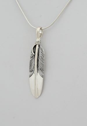Pendant with Medium Feather by Raymond Coriz