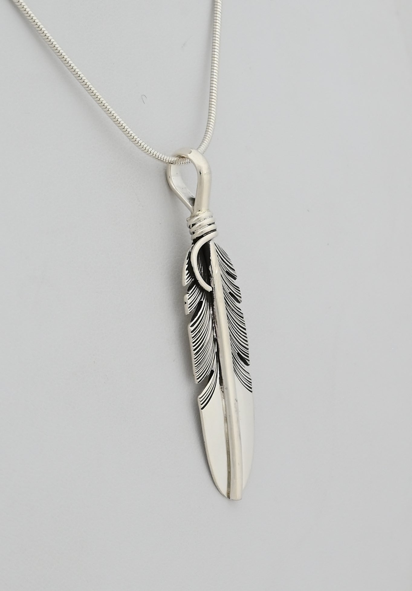 Pendant with Medium Feather by Raymond Coriz