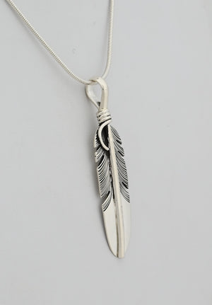 Pendant with Medium Feather by Raymond Coriz