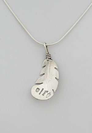 Pendant with Curved Feather by Raymond Coriz
