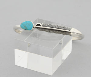 Bracelet with Feather and Kingman Turquoise by Raymond Coriz