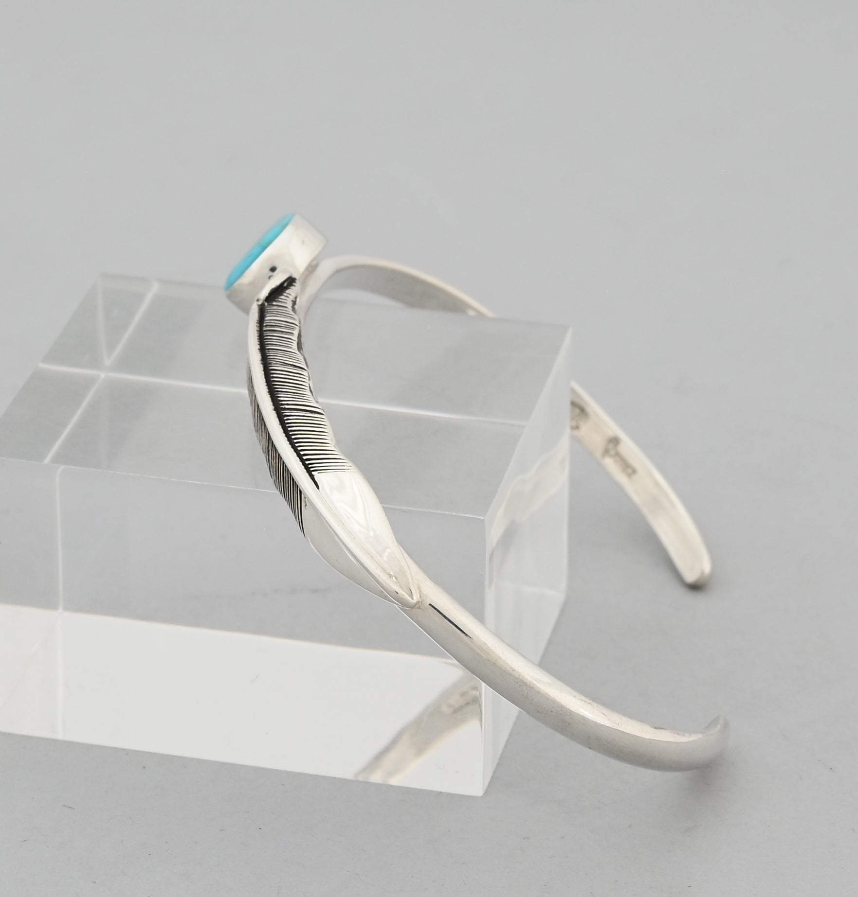 Bracelet with Feather and Kingman Turquoise by Raymond Coriz