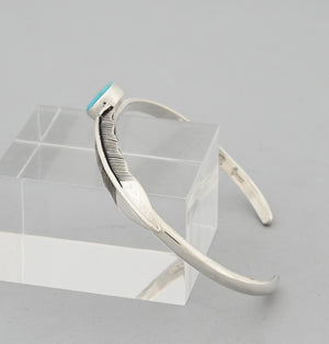 Bracelet with Feather and Kingman Turquoise by Raymond Coriz