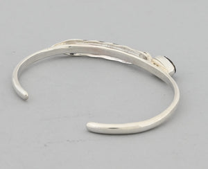 Bracelet with Feather and Golden Hills Turquoise by Raymond Coriz