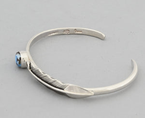 Bracelet with Feather and Golden Hills Turquoise by Raymond Coriz