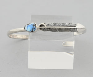 Bracelet with Feather and Golden Hills Turquoise by Raymond Coriz