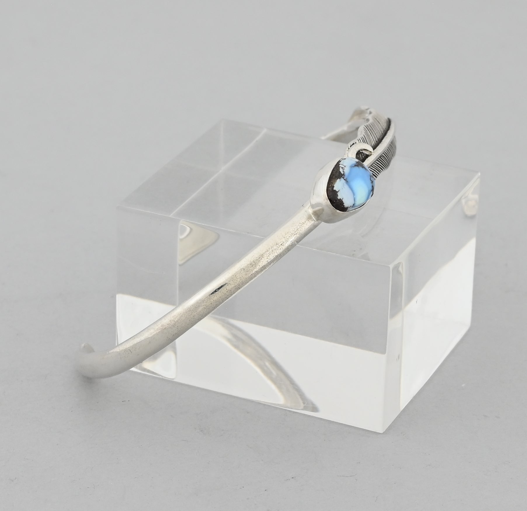 Bracelet with Feather and Golden Hills Turquoise by Raymond Coriz