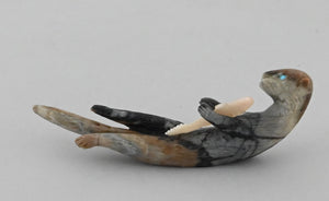 Otter with Fish Fetish by Lance Cheama
