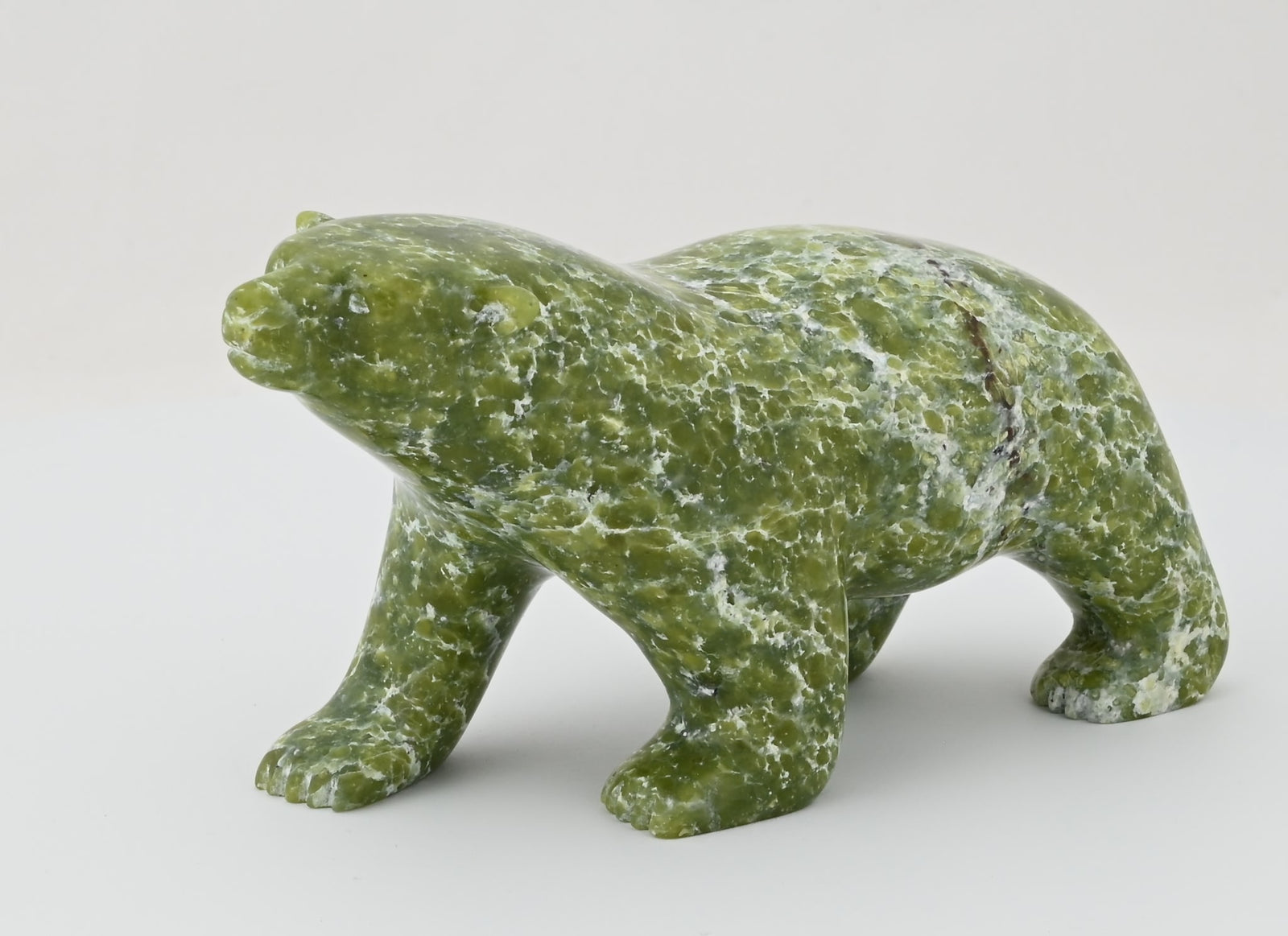 Walking Bear by Johnny Saggiatok