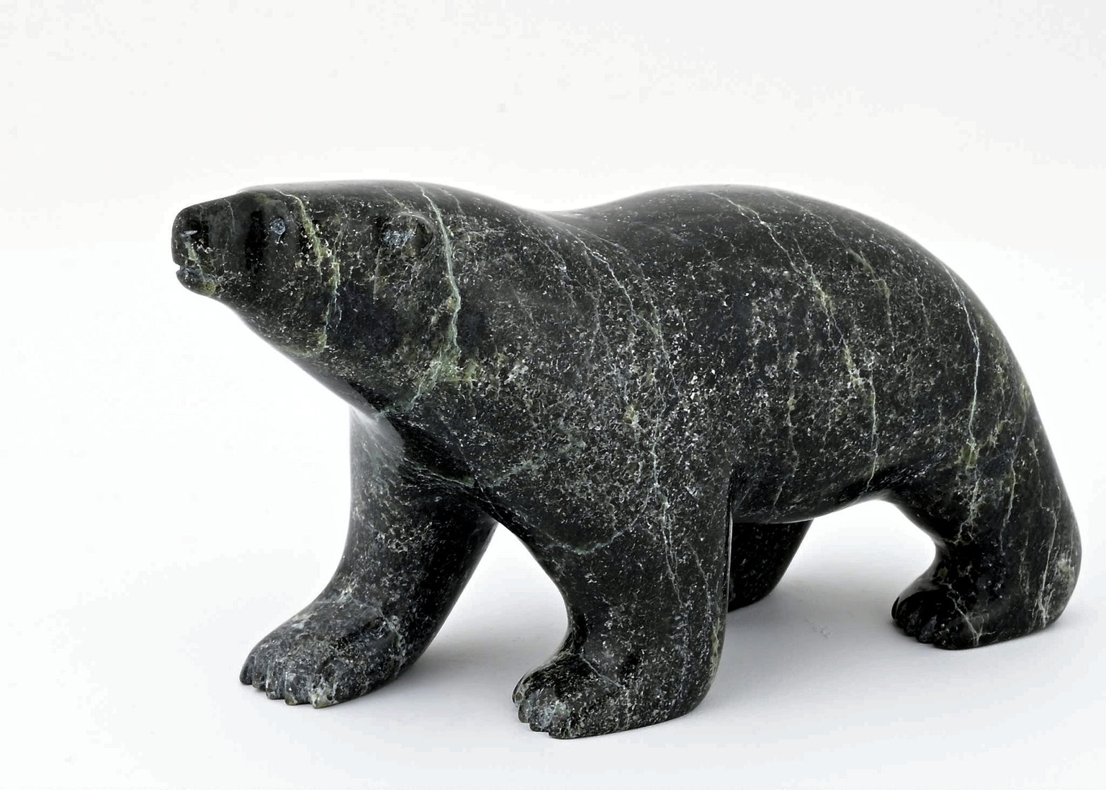 Walking Bear by Johnny Saggiatok