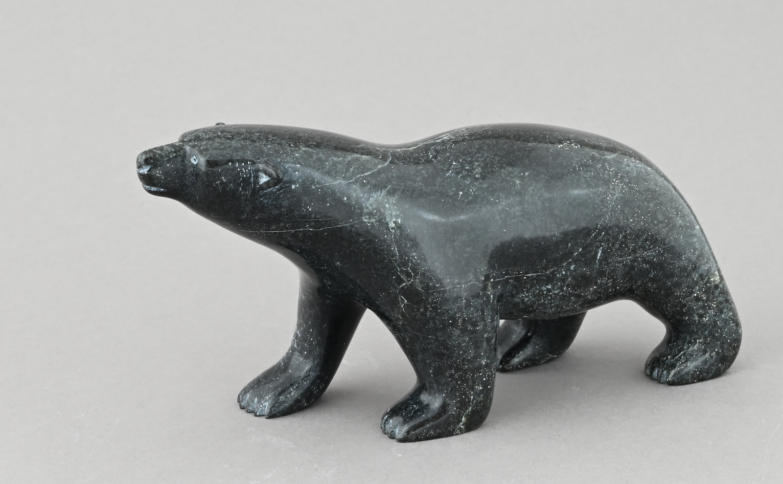 Walking Polar Bear by Johnny Sagiatuk