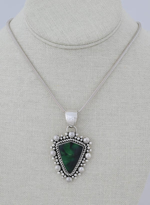 Pendant with Green Garnet by Artie Yellowhorse