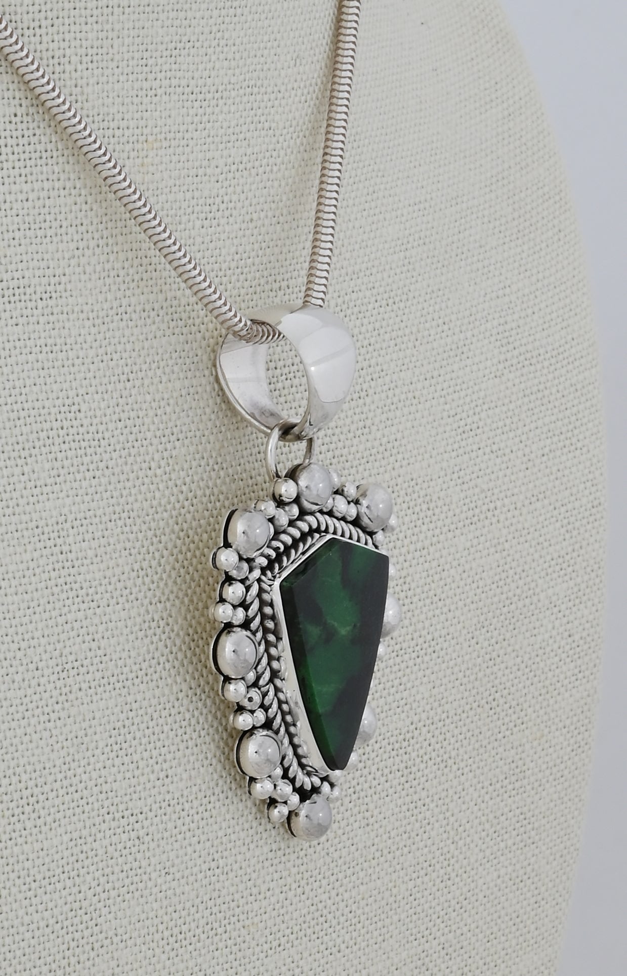 Pendant with Green Garnet by Artie Yellowhorse