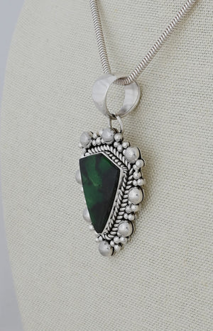 Pendant with Green Garnet by Artie Yellowhorse