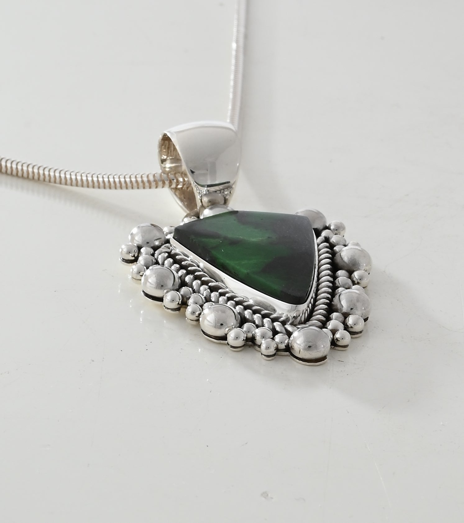 Pendant with Green Garnet by Artie Yellowhorse