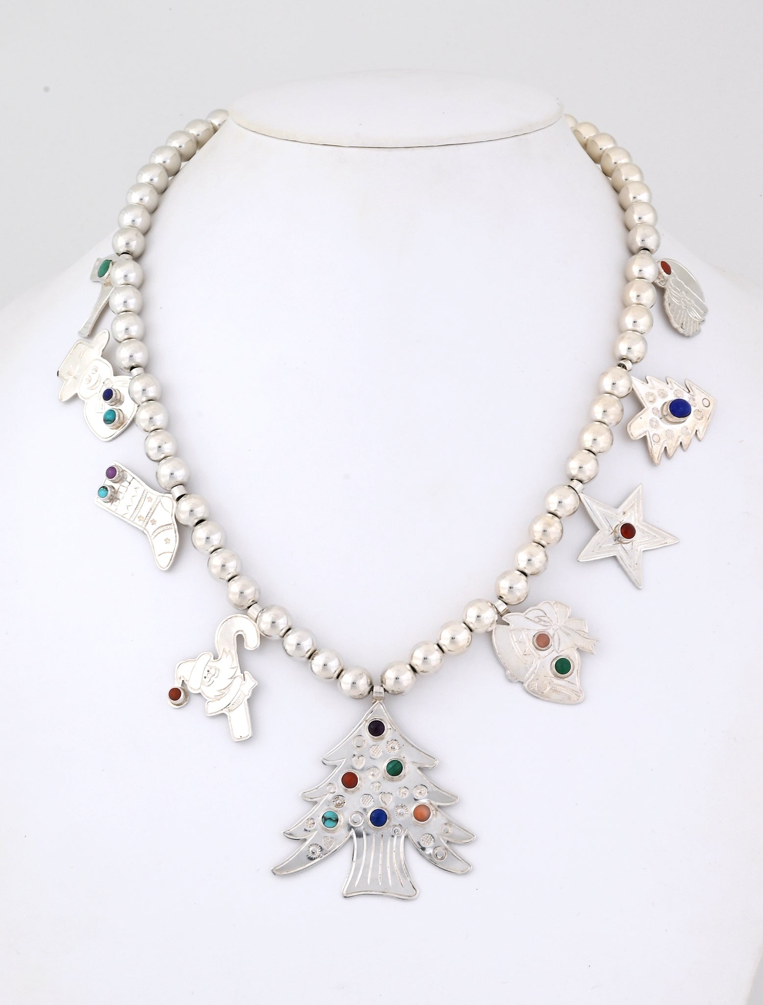 Necklace with Silver Christmas Charms by Don Lucas