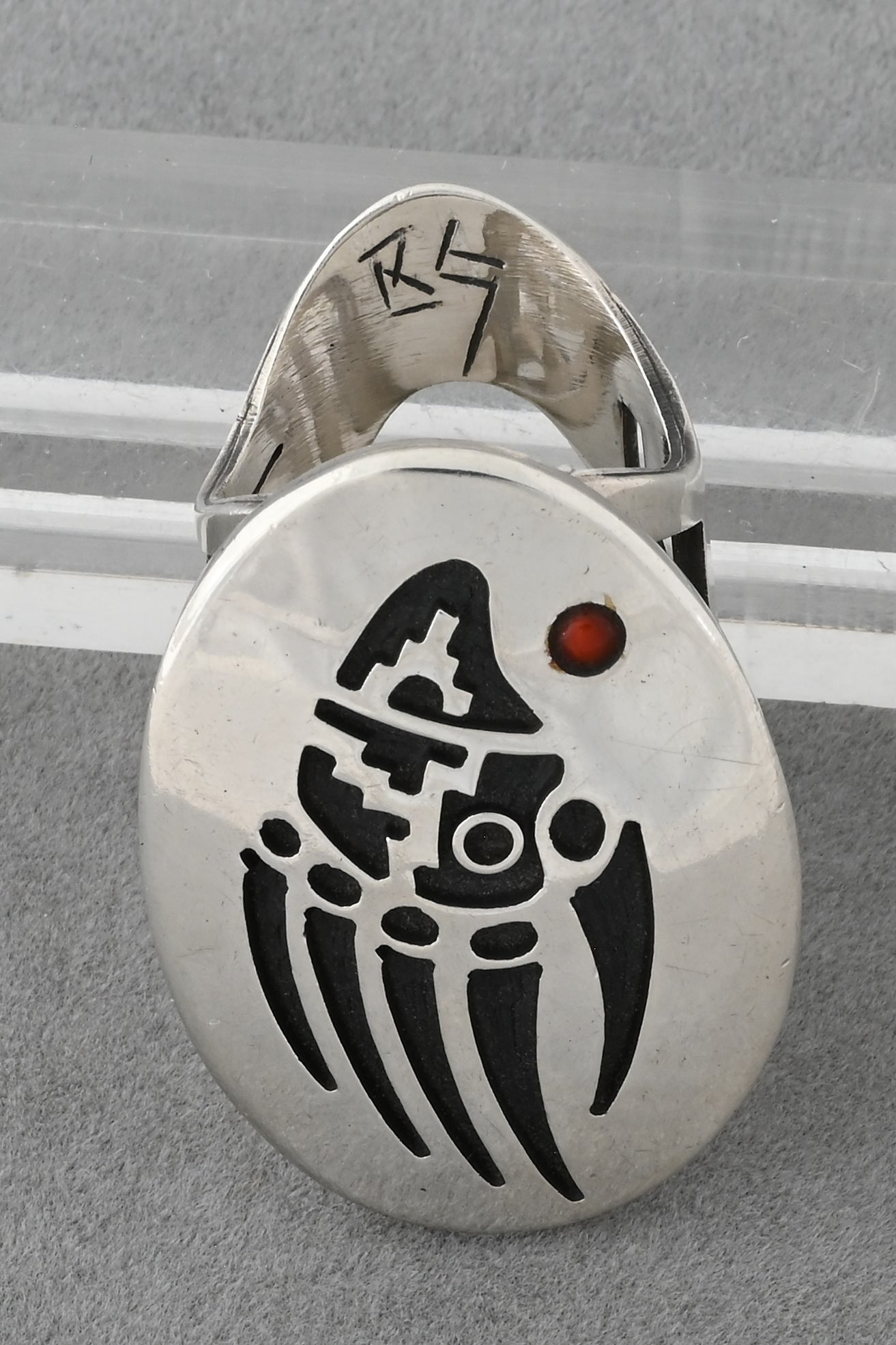 Hopi Overlay Ring with Badger Paw by Bobby Sekakuku