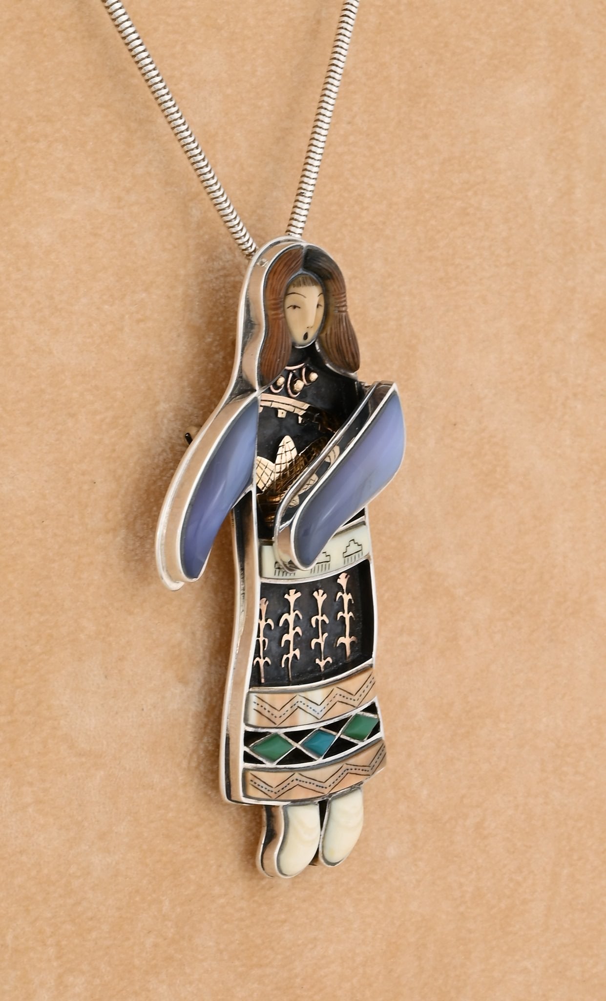 Hopi Woman Pin/Pendant (1996) by Denise and Samuel Wallace