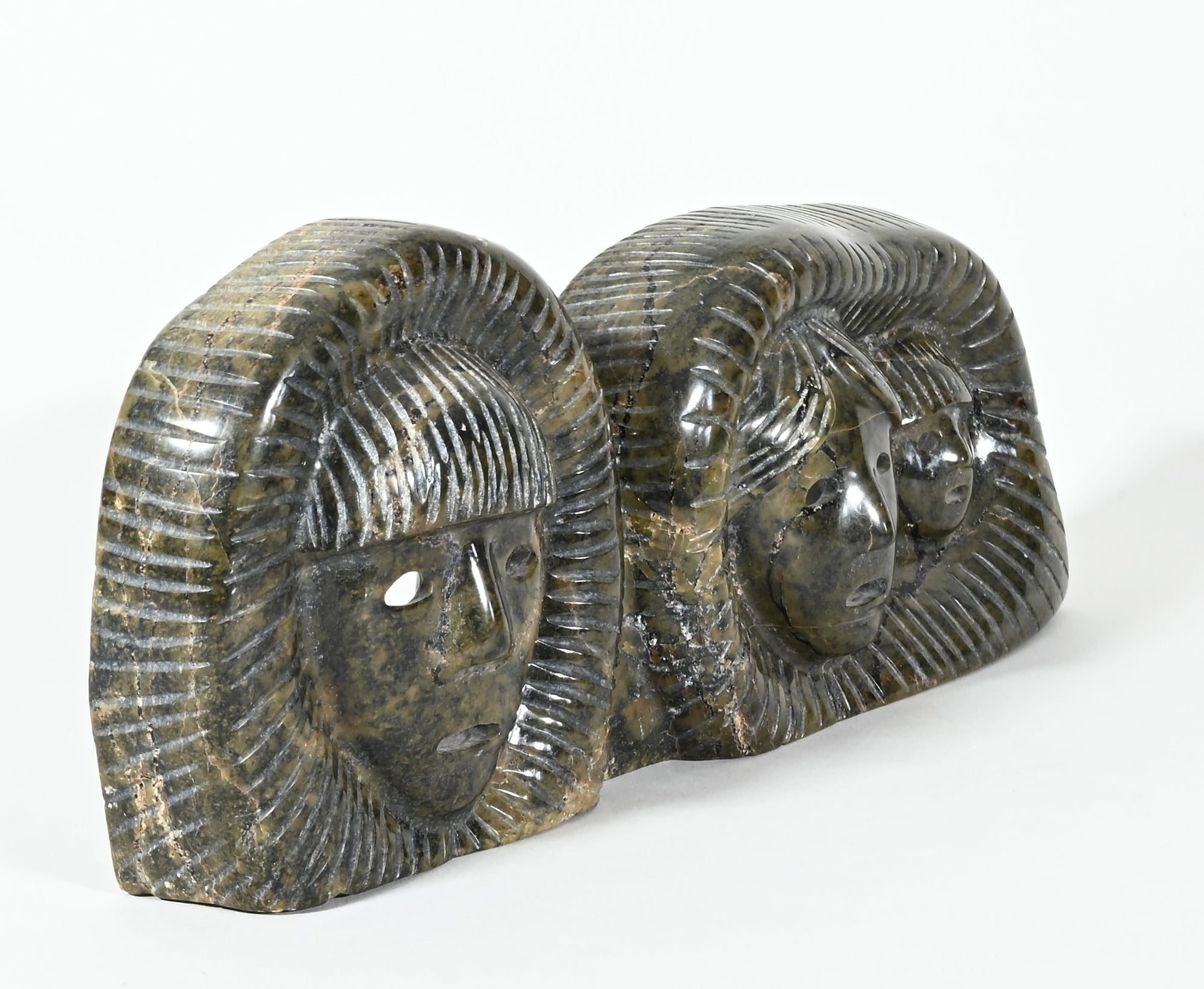 Inuit Family Faces by Tuk Nuna