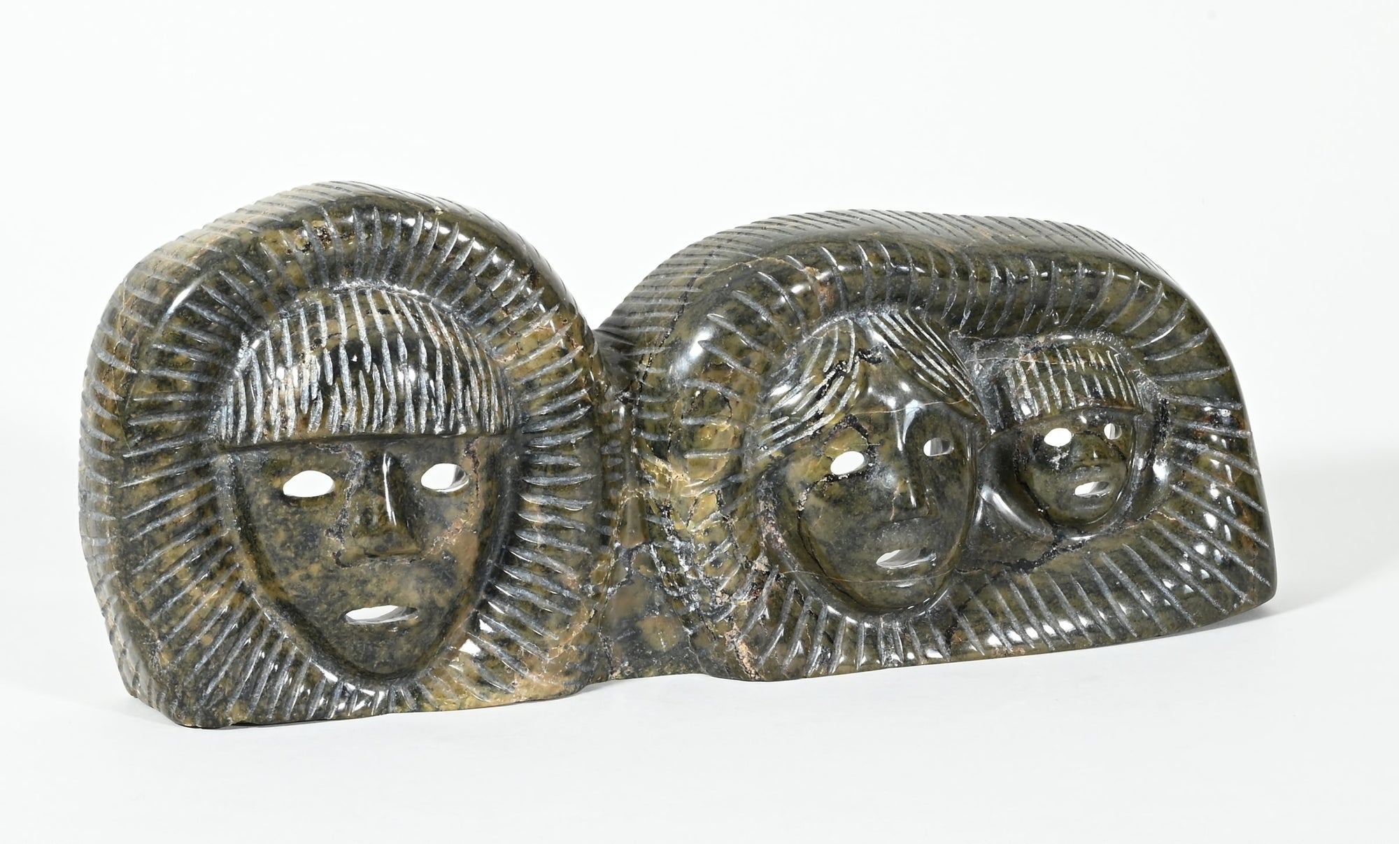 Inuit Family Faces by Tuk Nuna