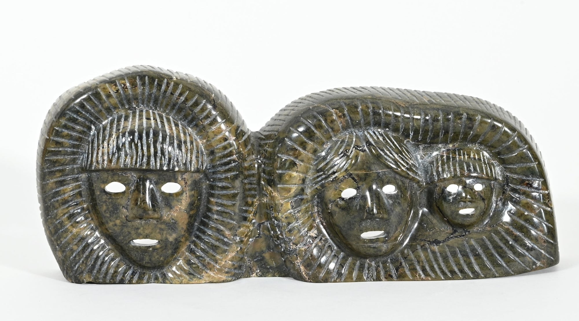Inuit Family Faces by Tuk Nuna